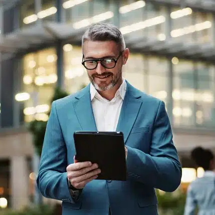 Accounting professional on tablet happy about personalized payment links that display their specific invoice details.